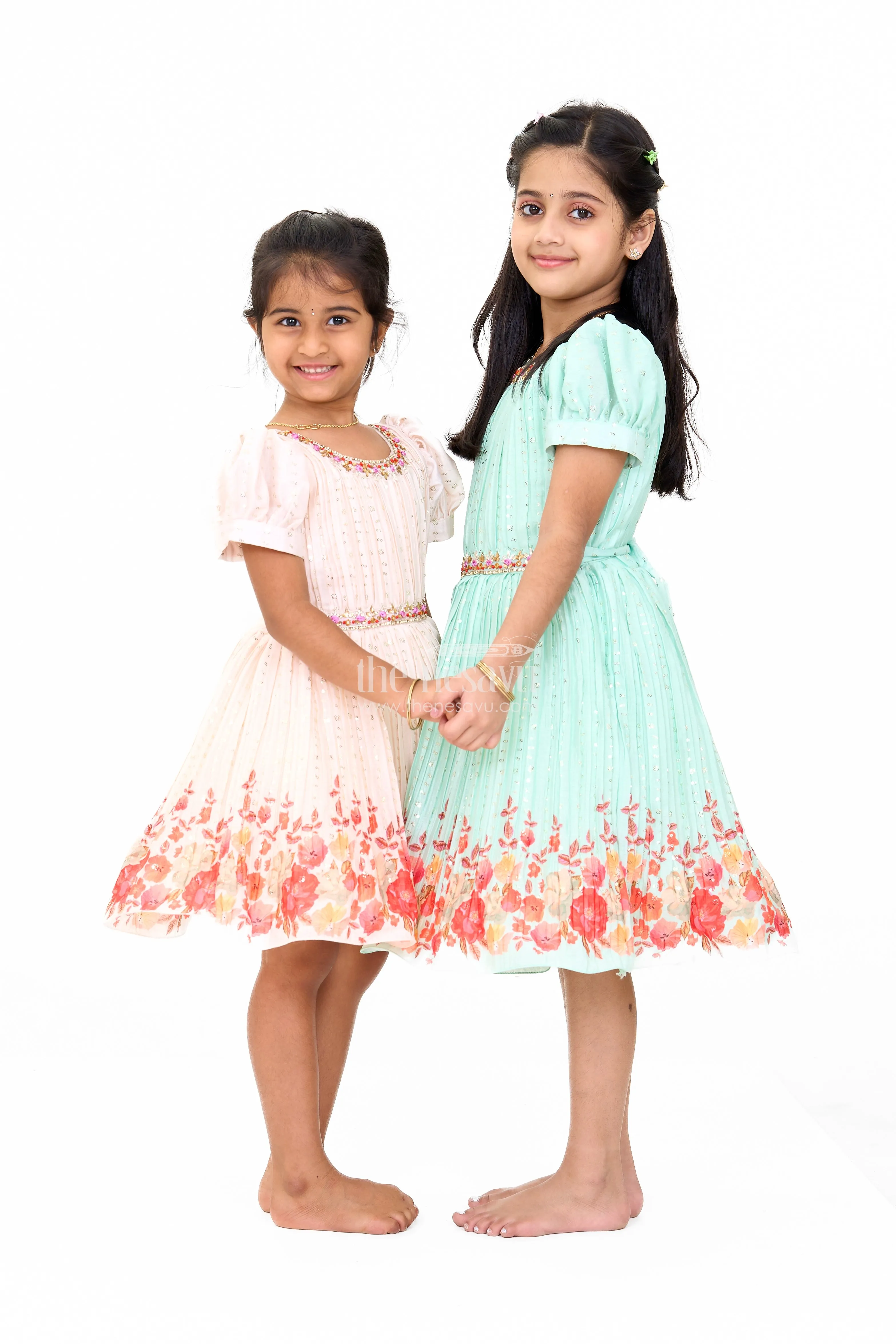 Mint Green Girls Fancy Frock with Floral Embellishments and Vibrant Border for Parties