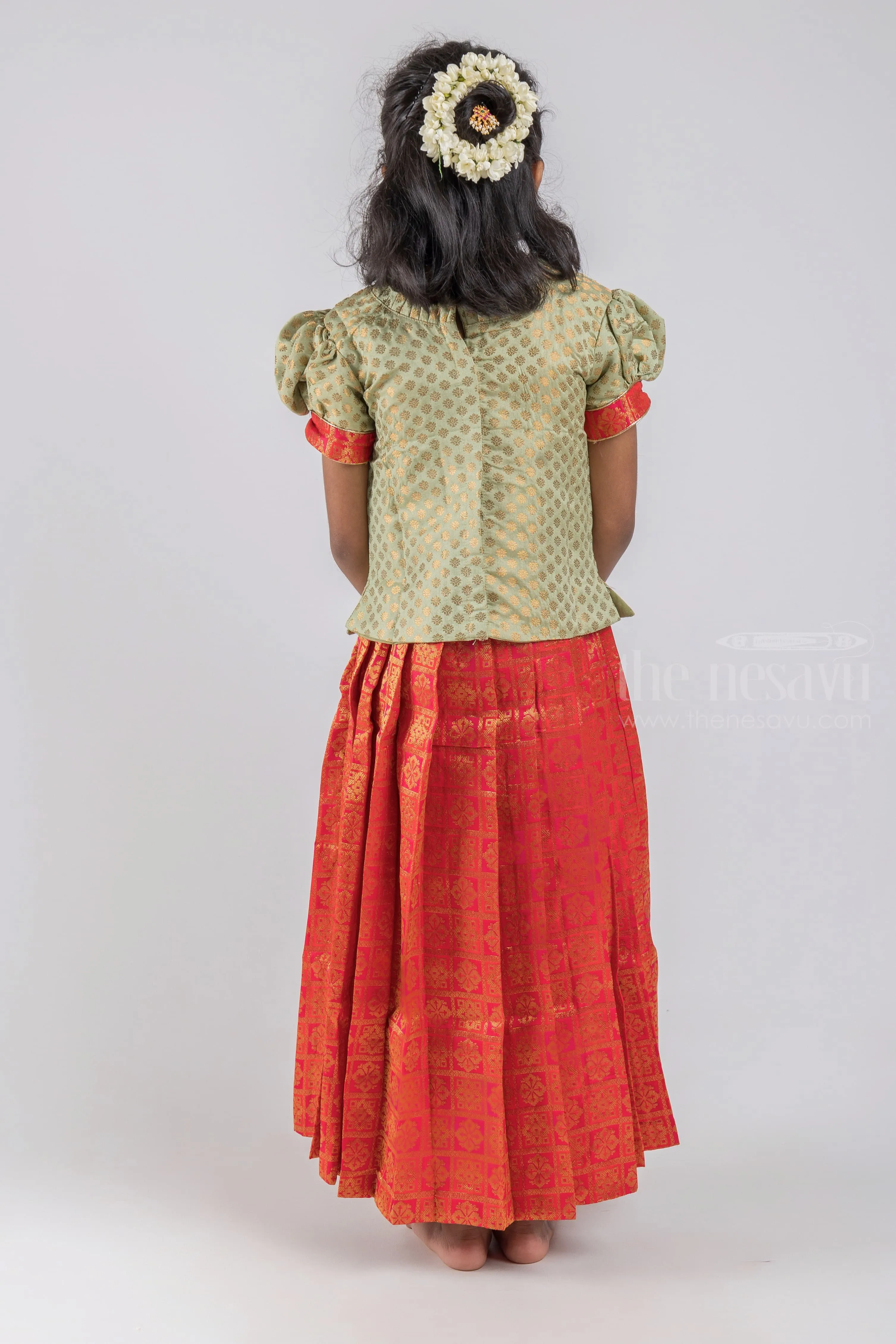 Pretty Lite Green Floral Designer Blouse And Orange Pleated Designer Silk Skirt For Girls