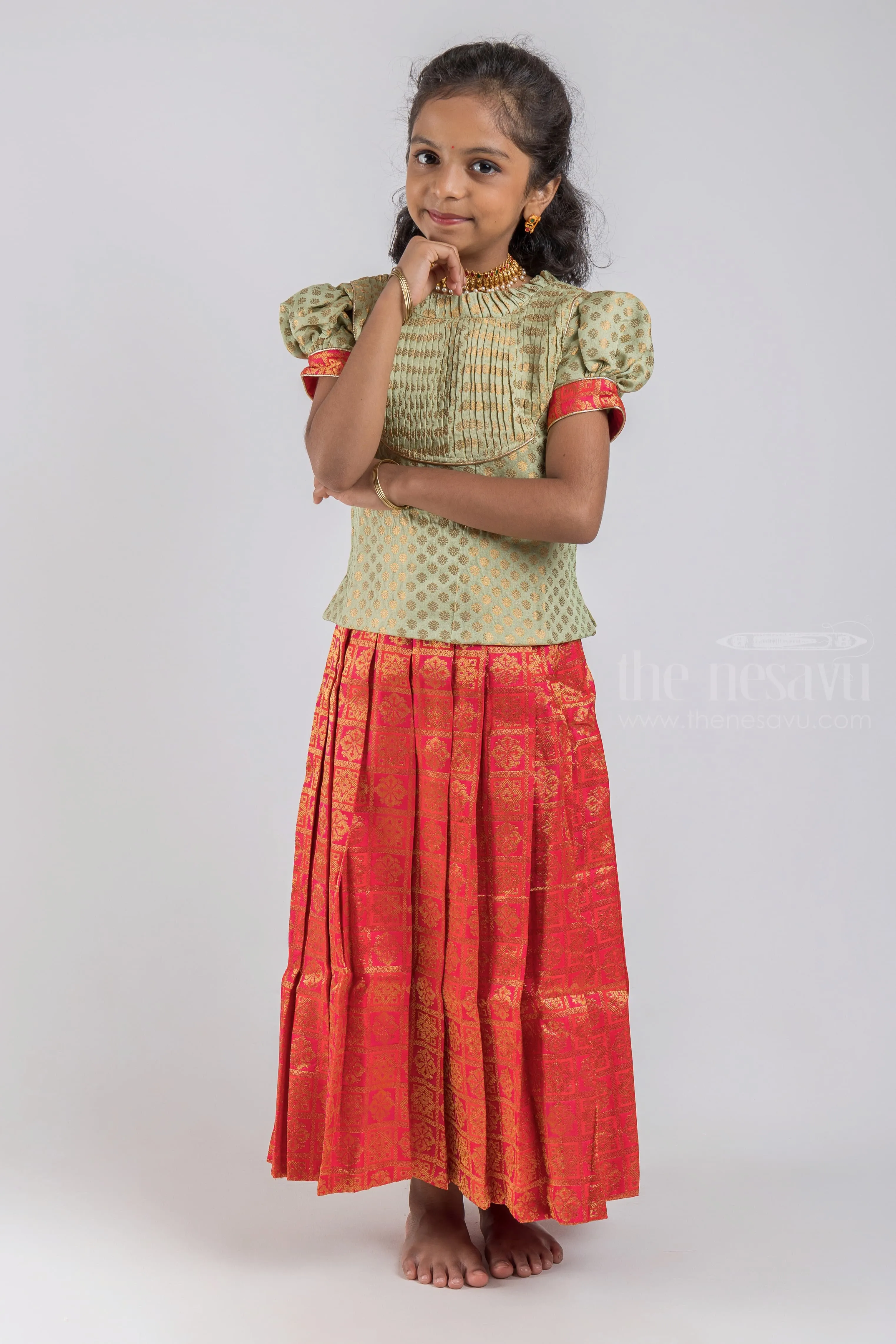 Pretty Lite Green Floral Designer Blouse And Orange Pleated Designer Silk Skirt For Girls