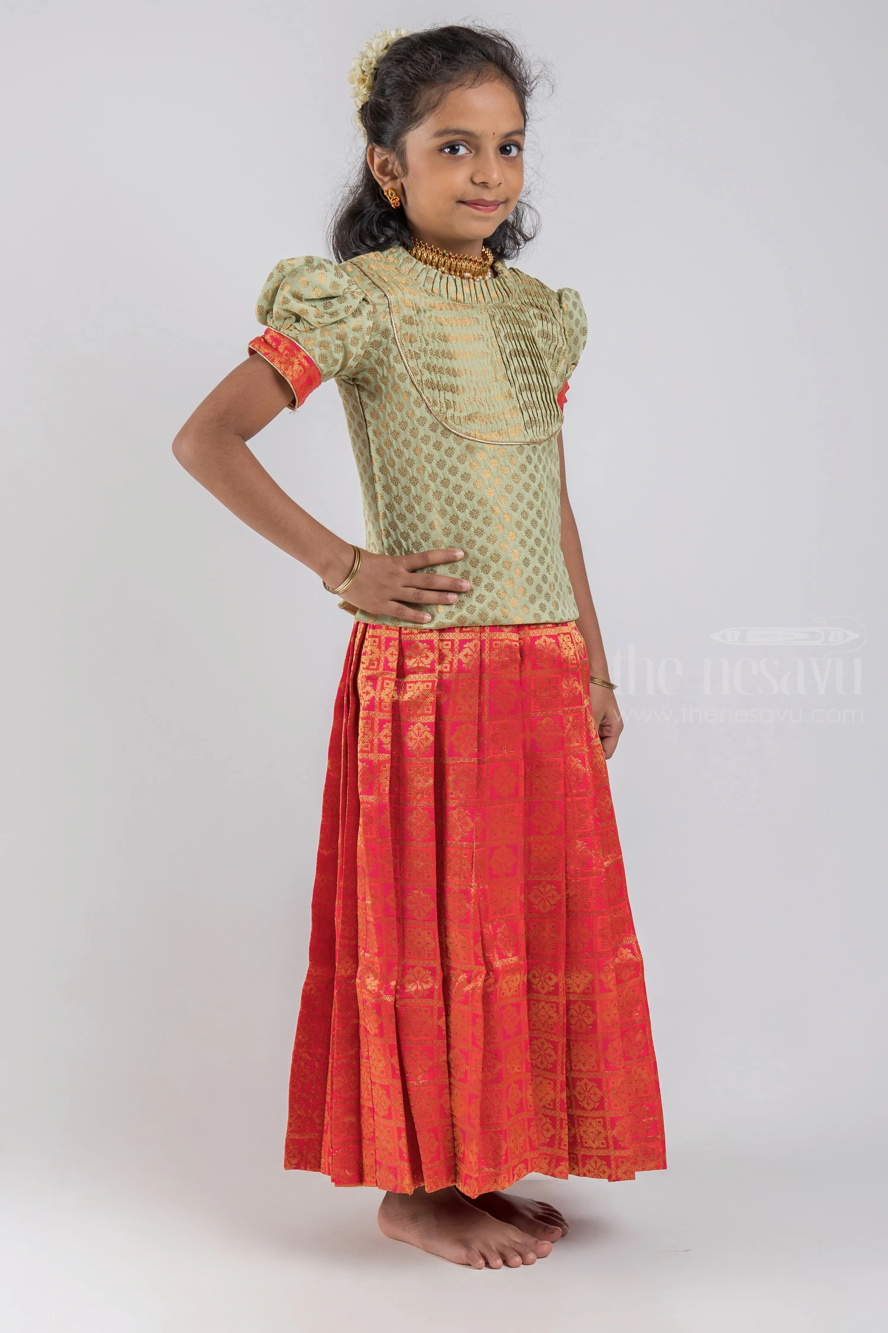 Pretty Lite Green Floral Designer Blouse And Orange Pleated Designer Silk Skirt For Girls